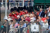 The Band of the Welsh Guards in the background, marching from The Mall to Horse Guards Parade during The Colonel's Review 2018 (final rehearsal for Trooping the Colour, The Queen's Birthday Parade)  at Horse Guards Parade, Westminster, London, 2 June 2018, 10:11.