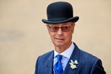 A quintessentially British spectator, wearing a suit and bowler hat, before The Colonel's Review 2018 (final rehearsal for Trooping the Colour, The Queen's Birthday Parade)  at Horse Guards Parade, Westminster, London, 2 June 2018, 10:11.