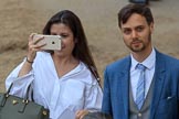 Well dressed couple arriving at Hprse Guards Parade for The Colonel's Review 2018 (final rehearsal for Trooping the Colour, The Queen's Birthday Parade)  at Horse Guards Parade, Westminster, London, 2 June 2018, 10:13.