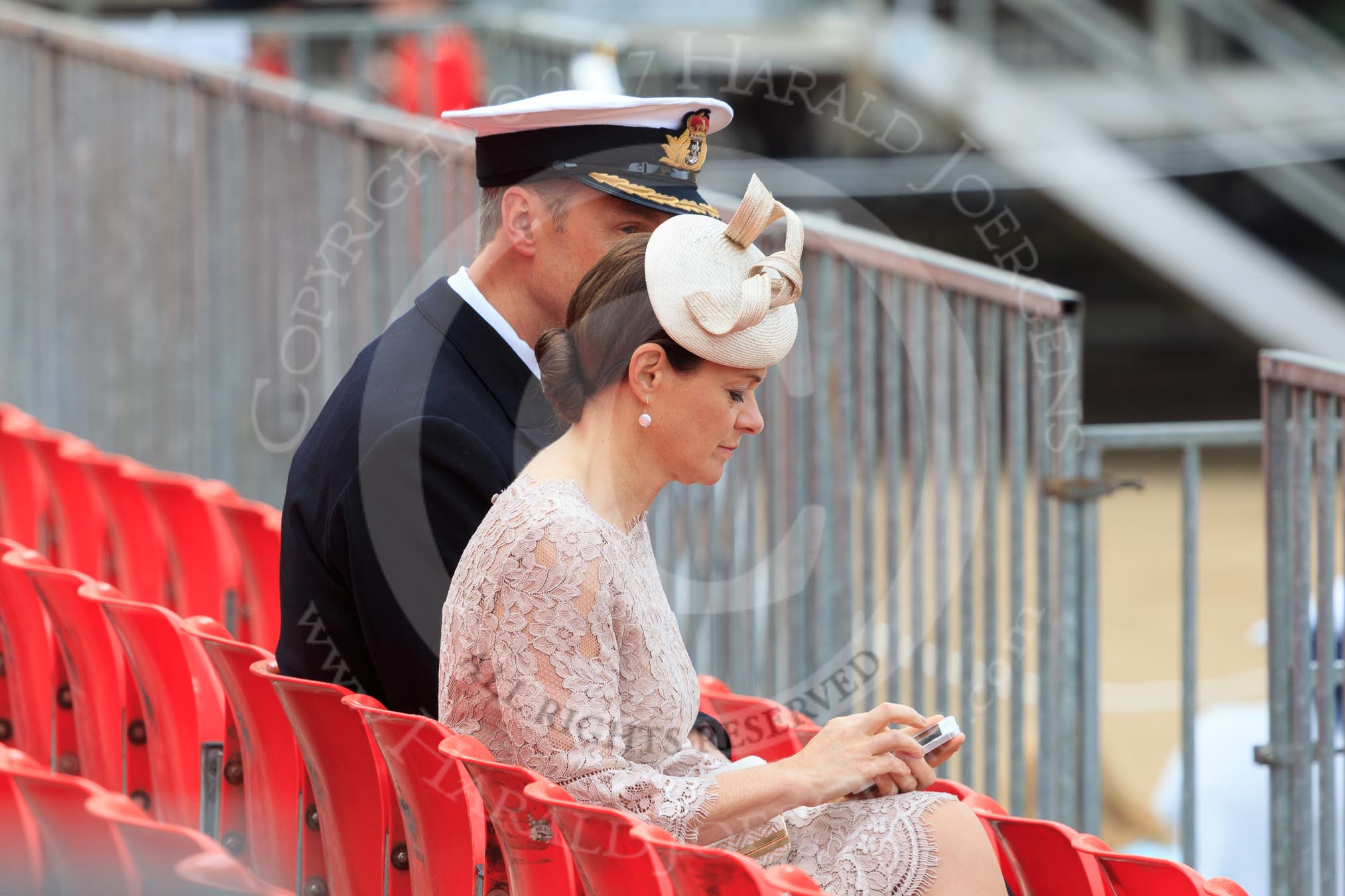Royal Navy Officer with his wife before Trooping the Colour 2018, The Queen's Birthday Parade at Horse Guards Parade, Westminster, London, 9 June 2018, 09:09.