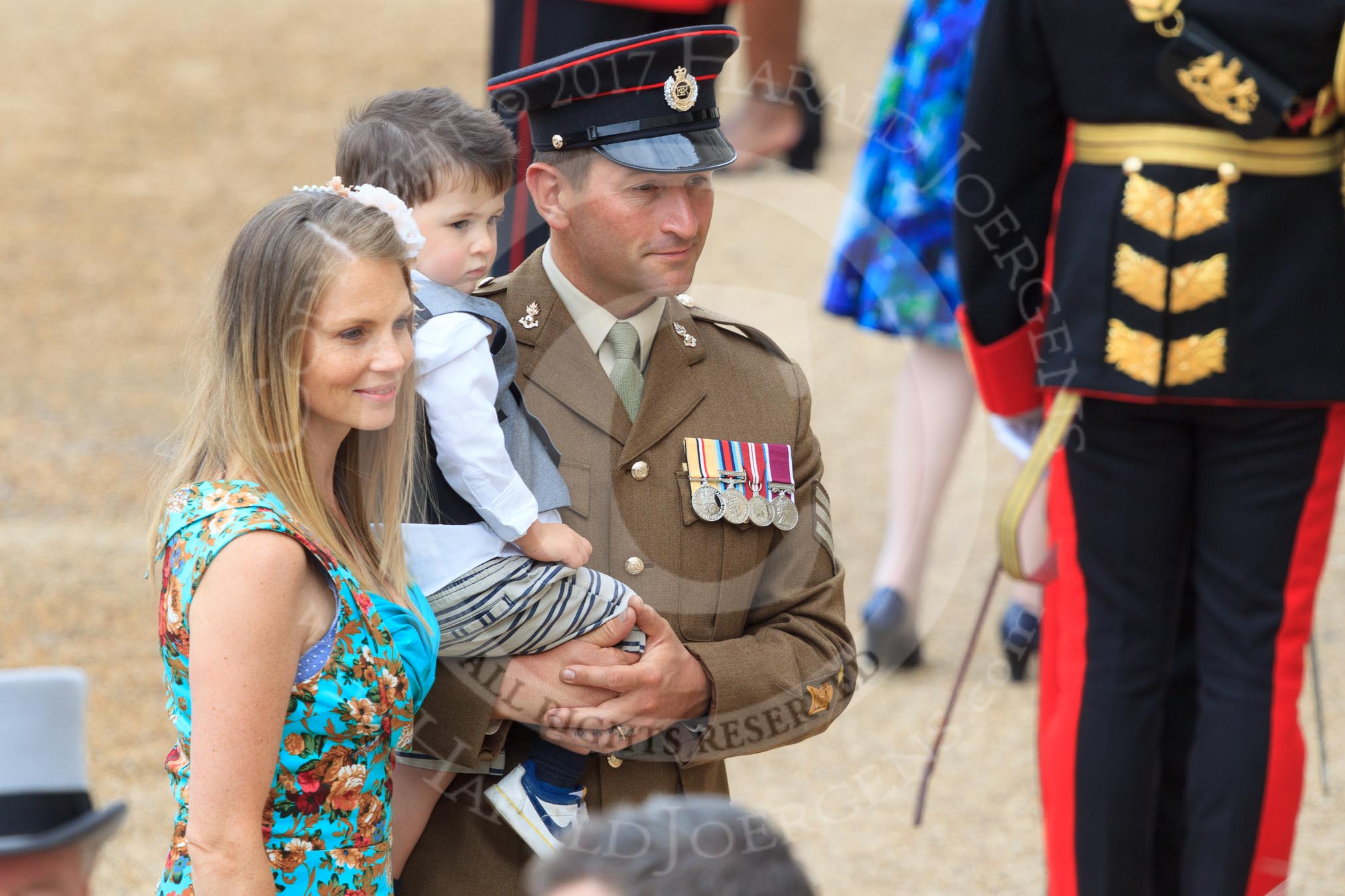 Army officer with wife and son before Trooping the Colour 2018, The Queen's Birthday Parade at Horse Guards Parade, Westminster, London, 9 June 2018, 09:19.
