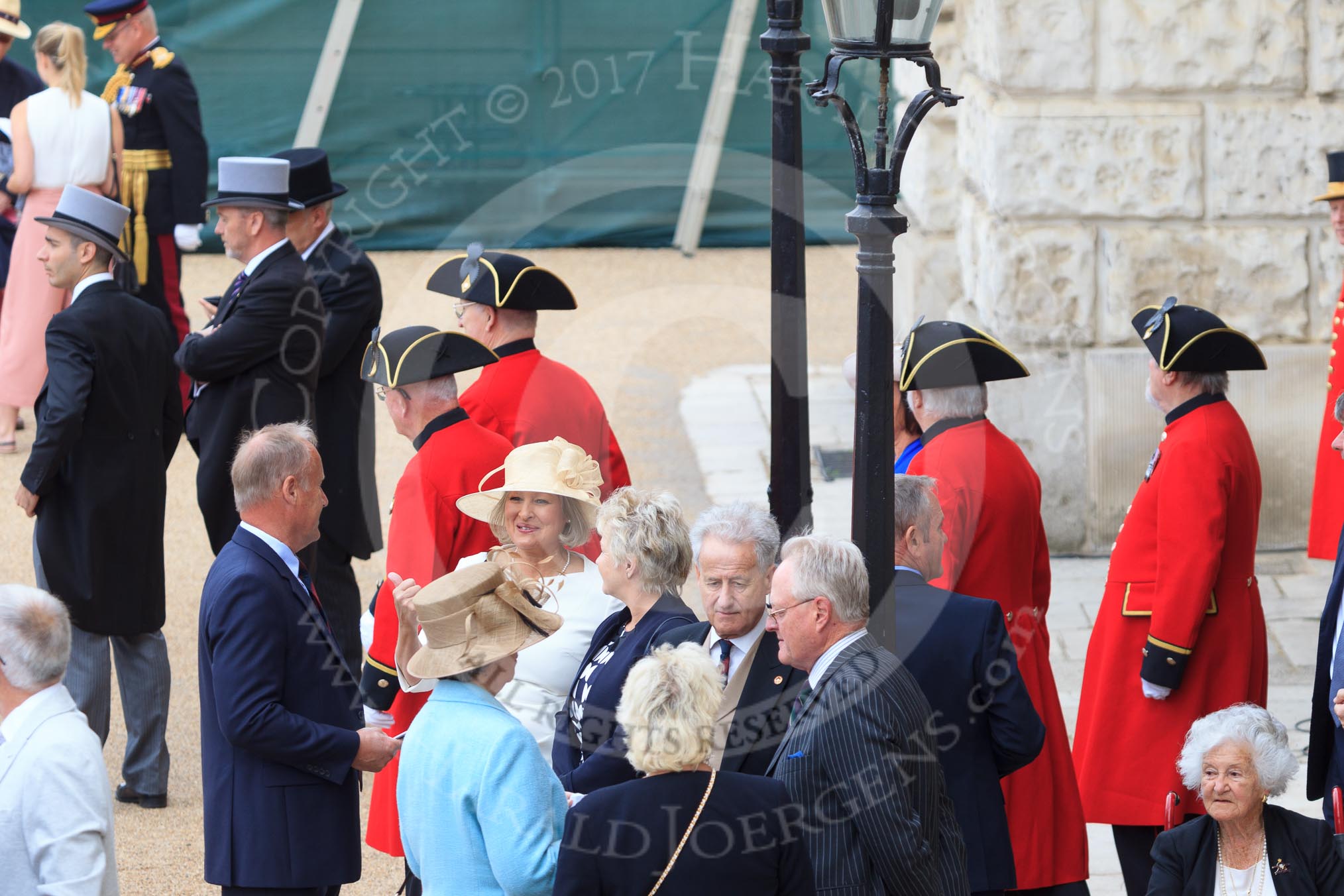 A group of Chelsea Pensioners arriving for Trooping the Colour 2018, The Queen's Birthday Parade at Horse Guards Parade, Westminster, London, 9 June 2018, 09:29.