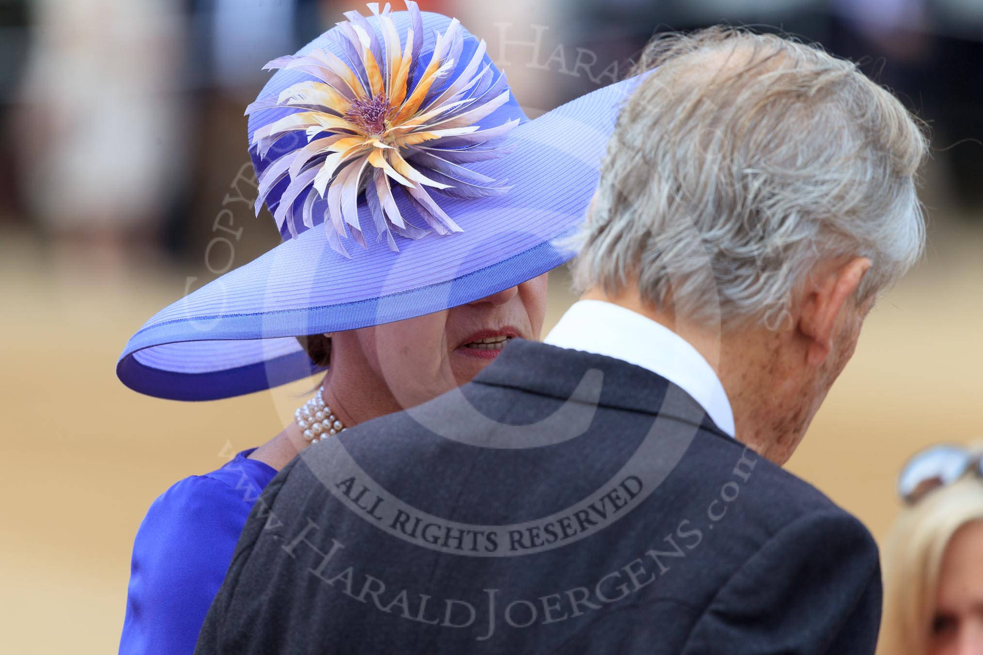Woman with spectacular blue hat at Trooping the Colour 2018, The Queen's Birthday Parade at Horse Guards Parade, Westminster, London, 9 June 2018, 09:38.