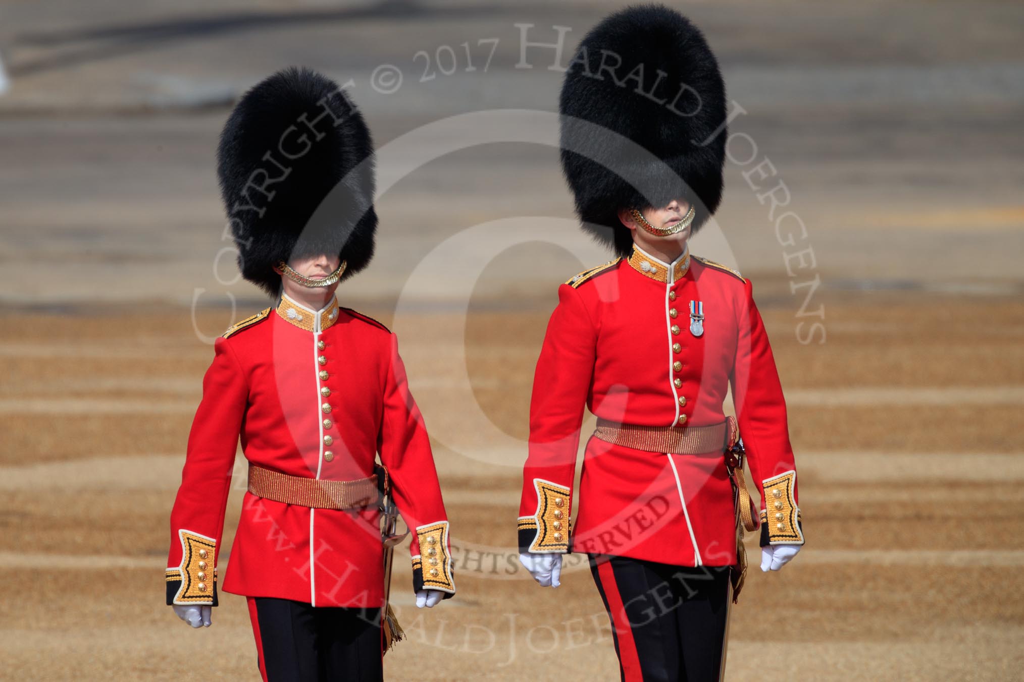 The Ensign, 2nd Lieutenant Felix Tracey, and The Captain of the Guard, Major Hamish Hardy, Number Five Guard, Nijmegen Company, Grenadier Guards, marching to Horse Guards Parade before Trooping the Colour 2018, The Queen's Birthday Parade at Horse Guards Parade, Westminster, London, 9 June 2018, 09:50.