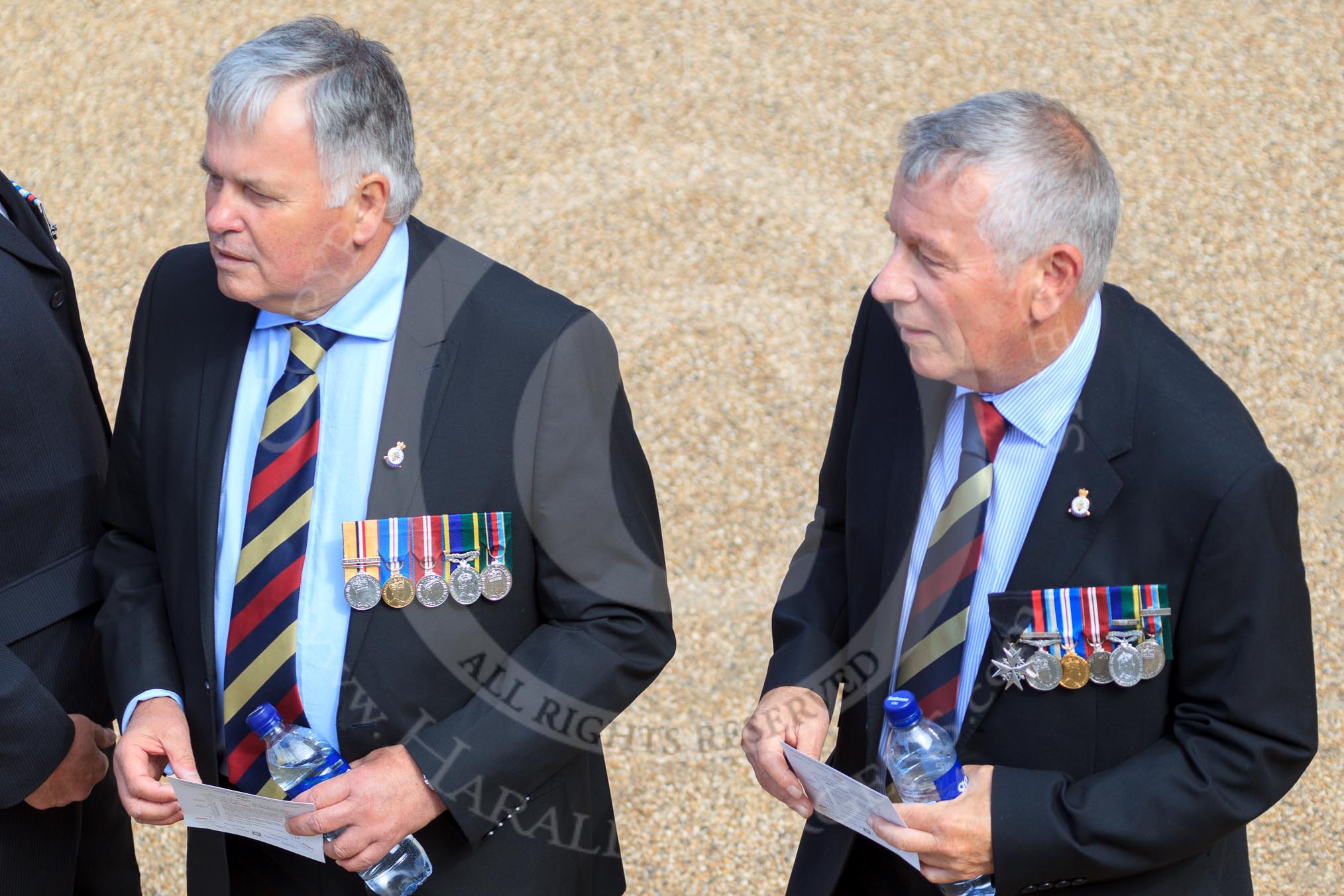 Two gentlemen in civilian clothes, wearing medals and Royal Army Medical Corps ties, before Trooping the Colour 2018, The Queen's Birthday Parade at Horse Guards Parade, Westminster, London, 9 June 2018, 10:07.