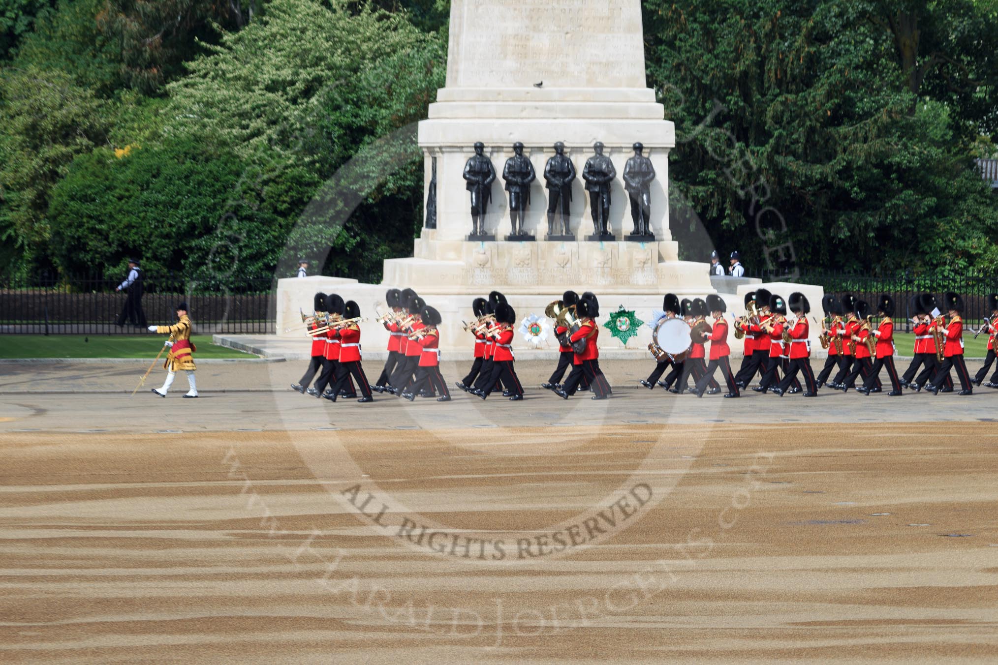 The Band of the Welsh Guards. led by Senior Drum Major Damian Thomas, Grenadier Guards, marching past the Guards Memorial during Trooping the Colour 2018, The Queen's Birthday Parade at Horse Guards Parade, Westminster, London, 9 June 2018, 10:13.