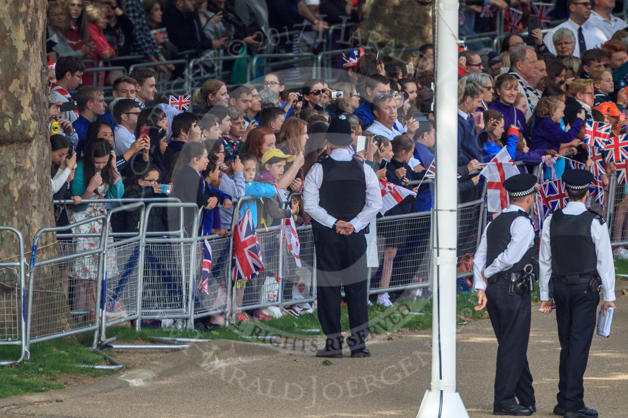 The crowded Youth Enclosure during Trooping the Colour 2018, The Queen's Birthday Parade at Horse Guards Parade, Westminster, London, 9 June 2018, 10:24.