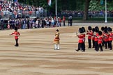 Senior Drum Major Damian Thomas, Grenadier Guards leading the Band of the Welsh Guards to their position on Horse Guards Parade (and the single musician marking the position moving out of the way) before Trooping the Colour 2018, The Queen's Birthday Parade at Horse Guards Parade, Westminster, London, 9 June 2018, 10:14.